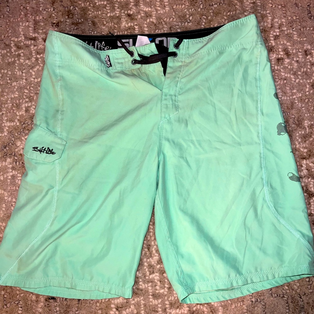 Mens Salt Life swim trunks.